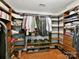 Large walk-in closet with custom shelving and ample storage at 3020 Sewee Ln, Waxhaw, NC 28173