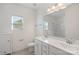 Bright bathroom featuring double sinks and a mirror at 3126 Elmwood Dr, Monroe, NC 28110