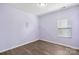 Pastel bedroom with wood floors and window with blinds at 3126 Elmwood Dr, Monroe, NC 28110