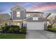 Two-story house with gray siding, white trim, and landscaping at 3126 Elmwood Dr, Monroe, NC 28110