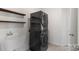 Laundry room with stacked washer and dryer and utility sink at 3126 Elmwood Dr, Monroe, NC 28110