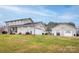 Two-story house with attached garage and separate outbuilding, nicely landscaped yard at 4105 South Fork Ave, Hickory, NC 28602