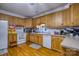 Kitchen with light wood cabinets, white appliances, and ample counter space at 4105 South Fork Ave, Hickory, NC 28602