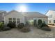 Brick patio with seating area and access to sunroom at 5021 Redwood Grove Trl # 86, Lancaster, SC 29720