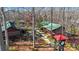 Aerial view of community with cabins and clock tower at 5021 Redwood Grove Trl # 86, Lancaster, SC 29720