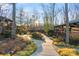 Curving concrete path connects charming log cabins at 5021 Redwood Grove Trl # 86, Lancaster, SC 29720