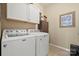 Laundry room with washer, dryer, and cabinets at 5021 Redwood Grove Trl # 86, Lancaster, SC 29720