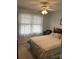 Light and airy bedroom with a double bed and ceiling fan at 506 Birmingham Ct, Rock Hill, SC 29732