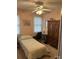 Small bedroom with a twin bed, desk, and wood dresser at 506 Birmingham Ct, Rock Hill, SC 29732