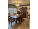 Formal dining room with large windows and wooden table at 506 Birmingham Ct, Rock Hill, SC 29732