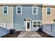 Backyard view of townhome with small patio at 638 Sagecroft Ln, Indian Trail, NC 28079