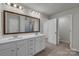 Elegant bathroom with double vanity and a large mirror at 638 Sagecroft Ln, Indian Trail, NC 28079