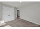 Bedroom with double doors leading to closet and hallway at 638 Sagecroft Ln, Indian Trail, NC 28079