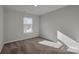 Bright bedroom with neutral walls and carpet flooring at 638 Sagecroft Ln, Indian Trail, NC 28079