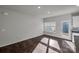 Bright dining area with hardwood floors and access to backyard at 638 Sagecroft Ln, Indian Trail, NC 28079