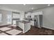 Spacious kitchen with stainless steel appliances and an island at 638 Sagecroft Ln, Indian Trail, NC 28079