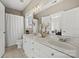 Double vanity bathroom with a shower and toilet at 7005 Shadow Rock Ct, Matthews, NC 28104