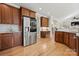 Kitchen with stainless steel appliances and wood cabinetry at 7005 Shadow Rock Ct, Matthews, NC 28104