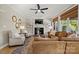 Relaxing living room with a fireplace and comfortable seating at 7005 Shadow Rock Ct, Matthews, NC 28104