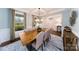 Bright dining room featuring a wood table and seating for six at 7657 Bainbridge Rd, Sherrills Ford, NC 28673