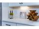 White quartz countertop with wine rack and glasses at 7657 Bainbridge Rd, Sherrills Ford, NC 28673