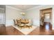 Formal dining room with hardwood floors and wainscoting at 7673 Bainbridge Rd, Sherrills Ford, NC 28673