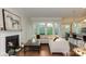 Bright living room with hardwood floors and large windows at 7673 Bainbridge Rd, Sherrills Ford, NC 28673