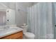 Clean bathroom with shower and single vanity at 7734 Garnkirk Dr, Huntersville, NC 28078