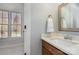 Simple bathroom with single vanity and window at 7734 Garnkirk Dr, Huntersville, NC 28078