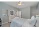 Bright bedroom with dresser and ceiling fan at 7734 Garnkirk Dr, Huntersville, NC 28078