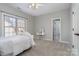 Cozy bedroom with vanity and window at 7734 Garnkirk Dr, Huntersville, NC 28078