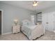 Charming bedroom with built-in shelving and ceiling fan at 7734 Garnkirk Dr, Huntersville, NC 28078