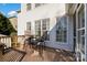 Wooden deck with small table and chairs at 7734 Garnkirk Dr, Huntersville, NC 28078