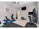 Home gym with stationary bike and elliptical at 7734 Garnkirk Dr, Huntersville, NC 28078