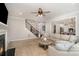 Open living room with view of kitchen and staircase at 7734 Garnkirk Dr, Huntersville, NC 28078