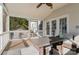 Screened porch with access to backyard at 7734 Garnkirk Dr, Huntersville, NC 28078