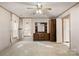 Bedroom with dresser, ceiling fan and carpet at 7933 Cherry Point Dr, Denver, NC 28037