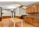 Dining area with laminate flooring and stone fireplace at 7933 Cherry Point Dr, Denver, NC 28037