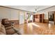 Spacious living room with laminate flooring and built-in shelving at 7933 Cherry Point Dr, Denver, NC 28037