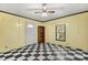 Living area with checkerboard floor and bookcase at 7933 Cherry Point Dr, Denver, NC 28037