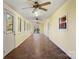 Bright sunroom with tile floor and French doors at 7933 Cherry Point Dr, Denver, NC 28037