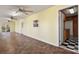 Sunroom with tile floor and ceiling fan at 7933 Cherry Point Dr, Denver, NC 28037