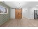 Dining area with a chevron accent wall and barn doors at 902 N Mountain St, Cherryville, NC 28021