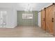 Dining room with a chevron wall and barn door at 902 N Mountain St, Cherryville, NC 28021