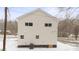 House exterior; light beige siding, snowy yard at 902 N Mountain St, Cherryville, NC 28021