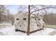 House exterior; light beige siding, snowy yard at 902 N Mountain St, Cherryville, NC 28021