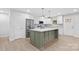 Modern kitchen with island, stainless steel appliances, and white cabinets at 902 N Mountain St, Cherryville, NC 28021