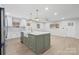 Modern kitchen with farmhouse sink and white cabinets at 902 N Mountain St, Cherryville, NC 28021