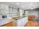 Updated kitchen featuring granite countertops and stainless steel appliances at 9435 Squirrel Hollow Ln, Charlotte, NC 28720