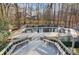 Elevated deck with benches overlooks a private in-ground pool at 9435 Squirrel Hollow Ln, Charlotte, NC 28720